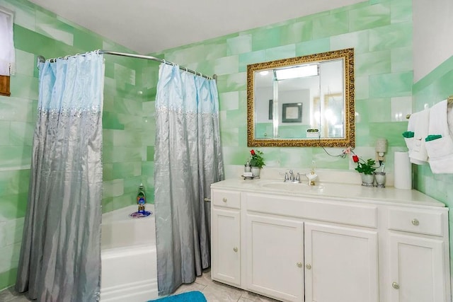 full bathroom featuring tile patterned floors, shower / bath combination with curtain, and vanity