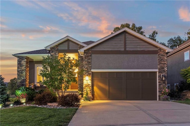 view of front of property with a garage