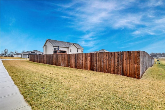 view of yard featuring fence