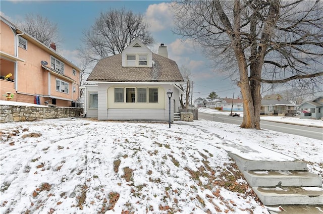 view of snow covered property