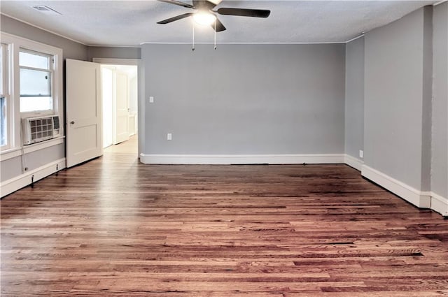 empty room with wood-type flooring, a textured ceiling, and ceiling fan