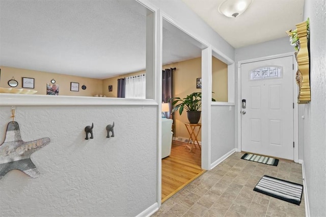 entrance foyer with baseboards