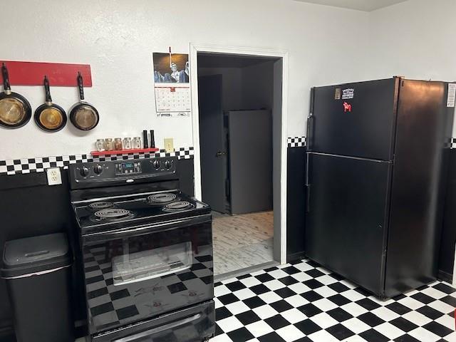 kitchen with black appliances