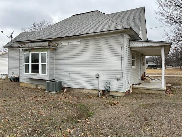 view of home's exterior featuring cooling unit