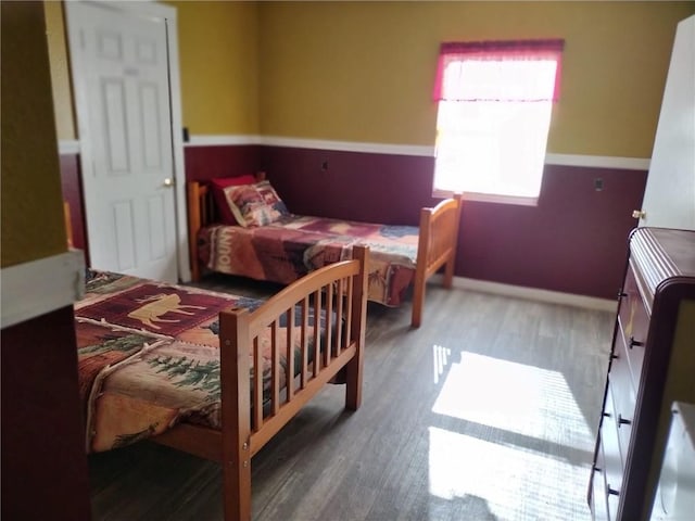 bedroom featuring hardwood / wood-style flooring