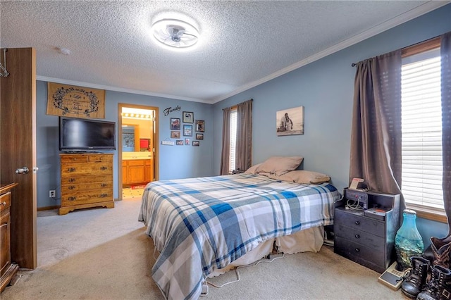 bedroom with ornamental molding, light colored carpet, a textured ceiling, and ensuite bath