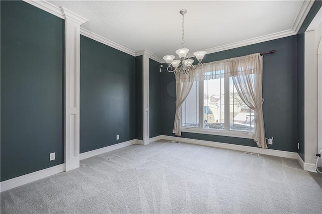 carpeted empty room with ornamental molding and a notable chandelier