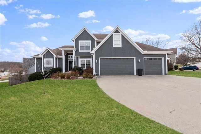 view of front of home with driveway, a front lawn, an attached garage, and stucco siding