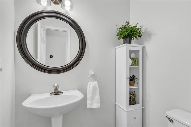 bathroom featuring a sink and toilet