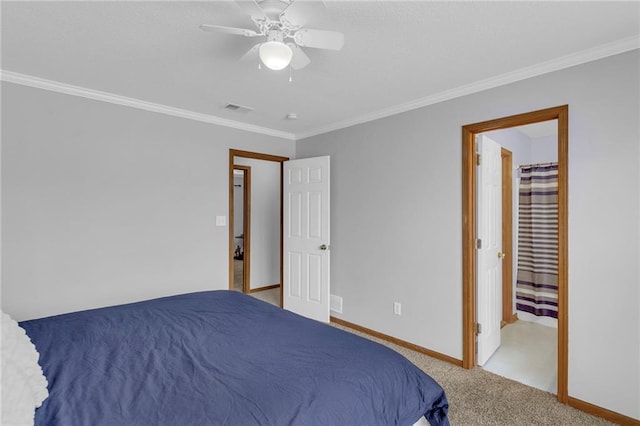 bedroom with ornamental molding, carpet flooring, visible vents, and baseboards