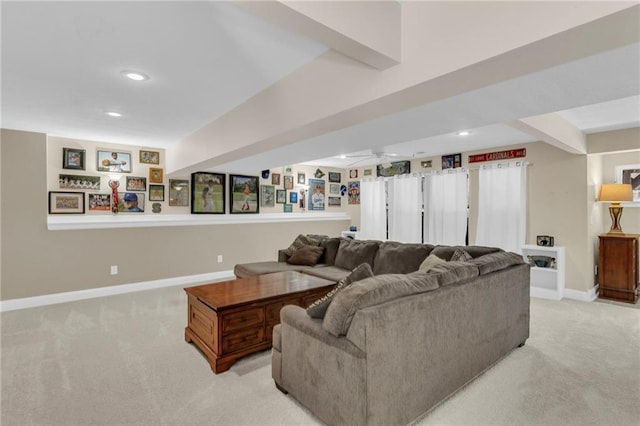 living room featuring light carpet, recessed lighting, beam ceiling, and baseboards