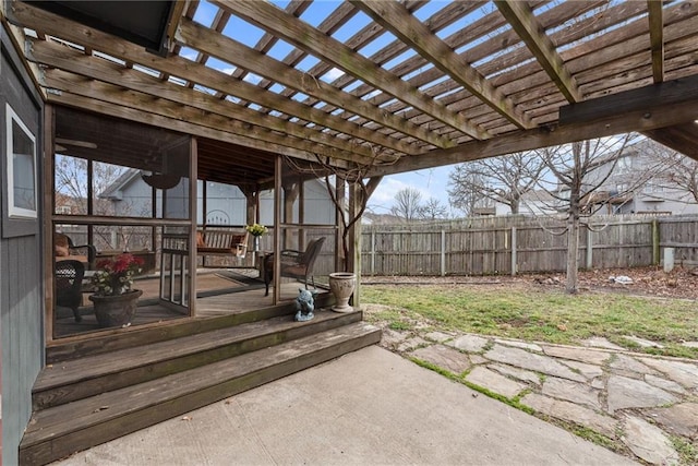 view of yard featuring a pergola, fence, and a patio