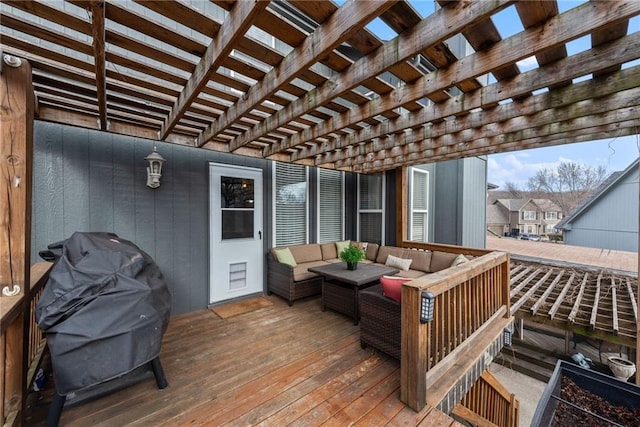 deck featuring an outdoor living space and a pergola