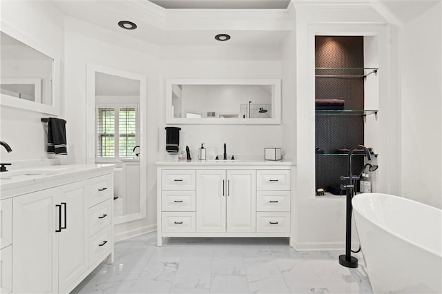 bathroom with vanity and a bathtub