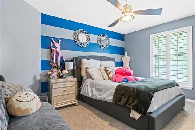 carpeted bedroom with ceiling fan