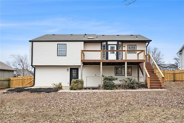 rear view of property with a deck