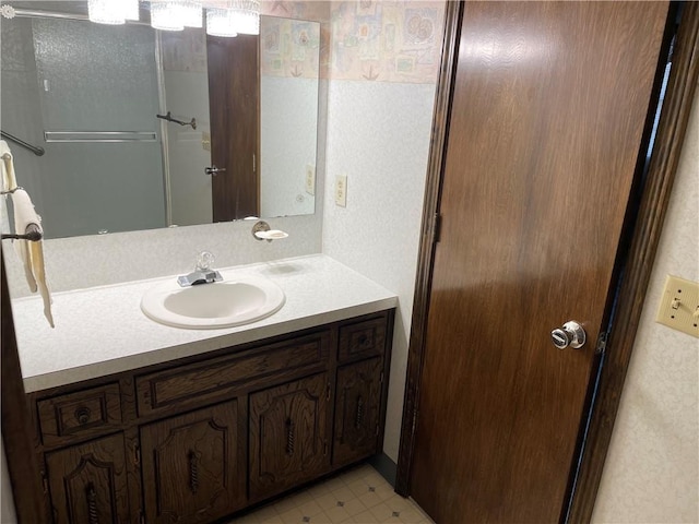 bathroom with vanity and tile patterned floors