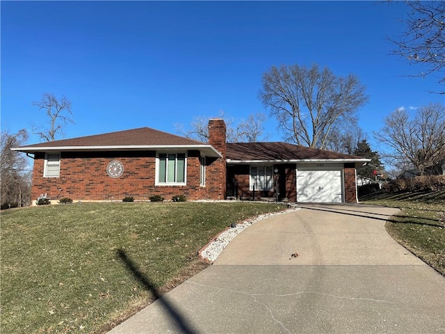 single story home featuring an attached garage, brick siding, driveway, a chimney, and a front yard