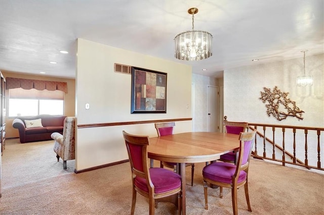 dining space with carpet, a chandelier, baseboards, and recessed lighting