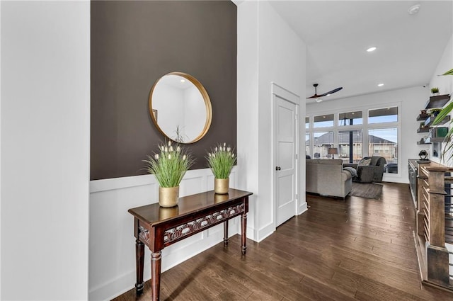 corridor with recessed lighting and dark wood-style flooring