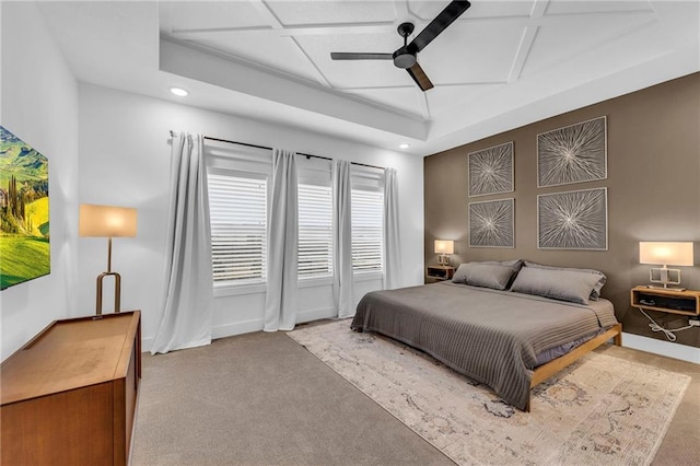 bedroom featuring light carpet, coffered ceiling, and baseboards