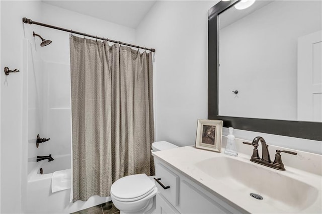 full bath featuring shower / tub combo, vanity, and toilet