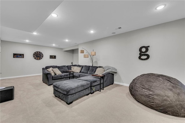 living area with light colored carpet, visible vents, baseboards, and recessed lighting