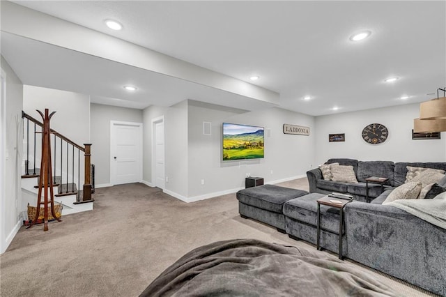 living room featuring stairs, carpet floors, baseboards, and recessed lighting