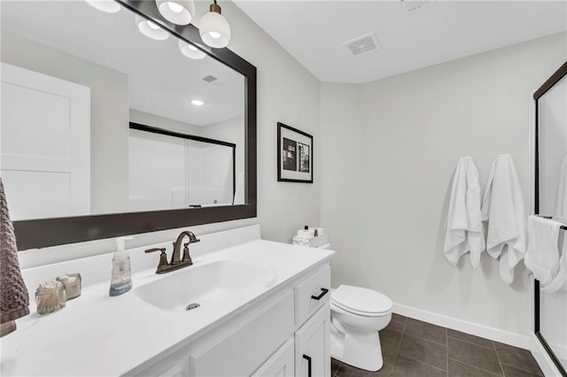 full bath with baseboards, visible vents, a shower stall, and vanity