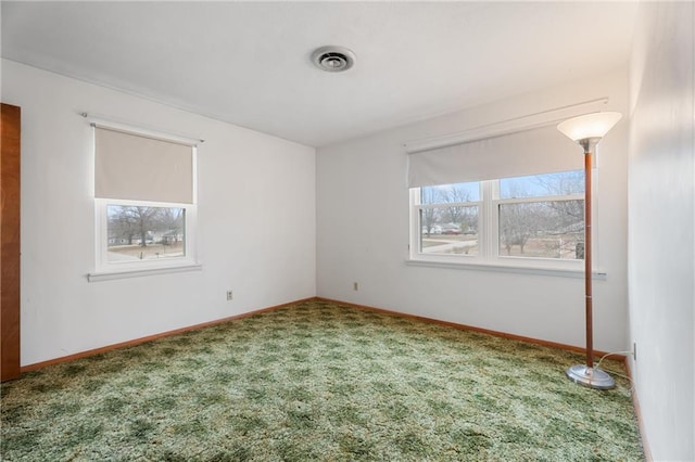 view of carpeted spare room