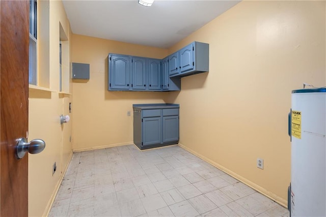 clothes washing area with water heater