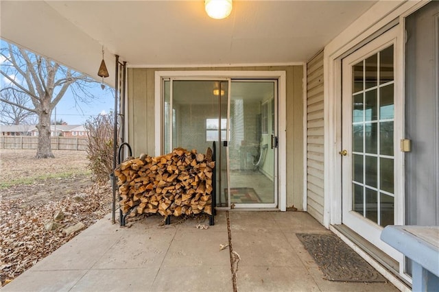 entrance to property with a patio area