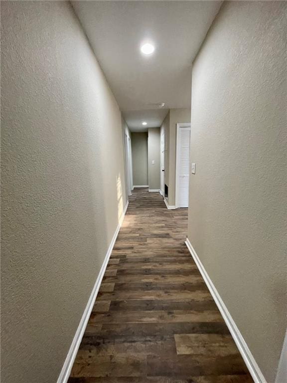 hallway featuring dark hardwood / wood-style floors