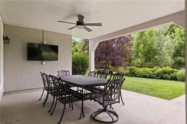 view of patio / terrace with outdoor dining space and ceiling fan