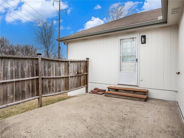 property entrance with a patio area