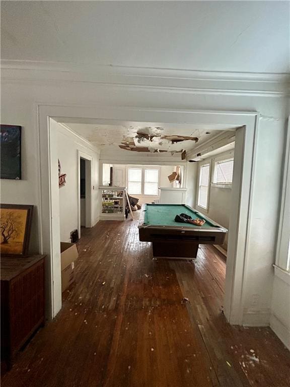 game room with crown molding, pool table, and dark hardwood / wood-style flooring