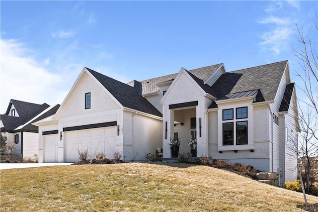 modern farmhouse with metal roof, brick siding, a standing seam roof, and a front yard