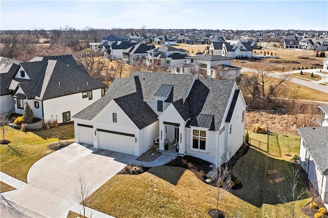 bird's eye view with a residential view