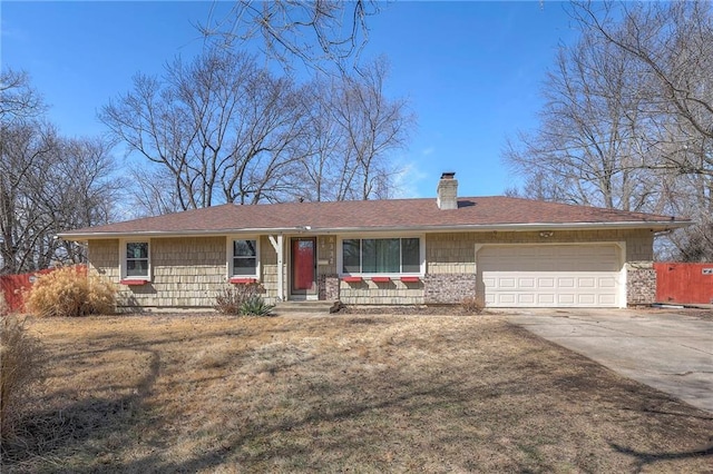 ranch-style house featuring driveway, a chimney, an attached garage, and fence