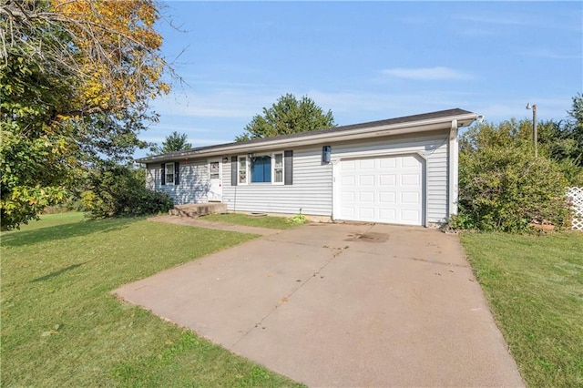 ranch-style house with a garage, concrete driveway, and a front yard