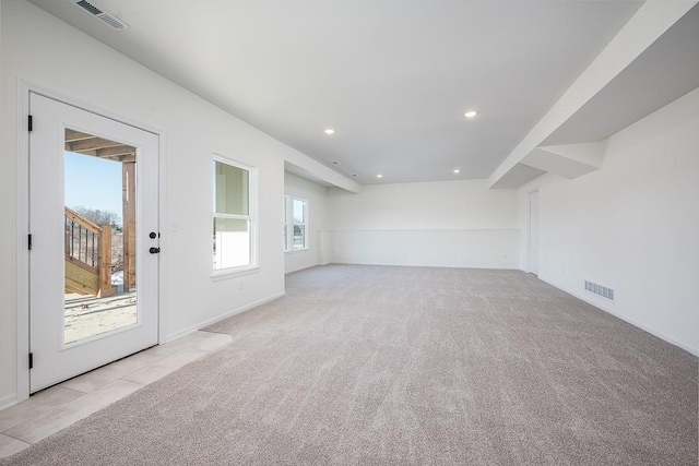 view of carpeted spare room