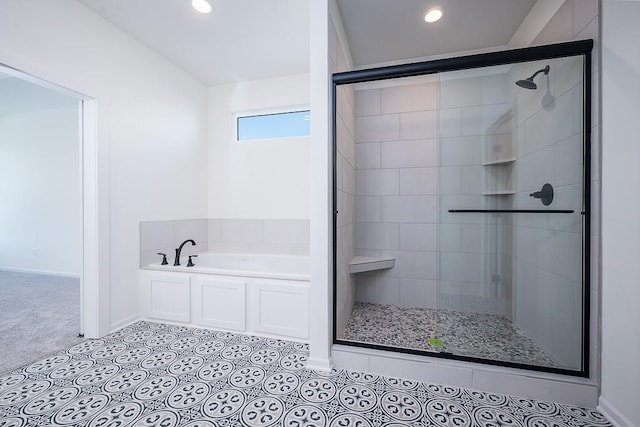 bathroom with lofted ceiling, tile patterned floors, and shower with separate bathtub