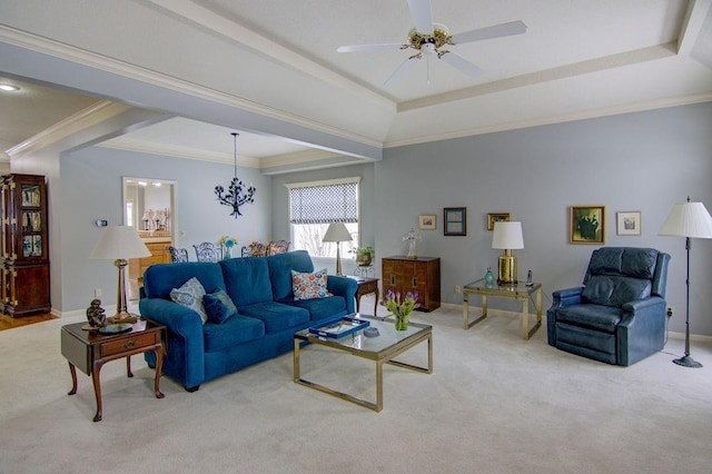 living room featuring ornamental molding, a raised ceiling, and light carpet