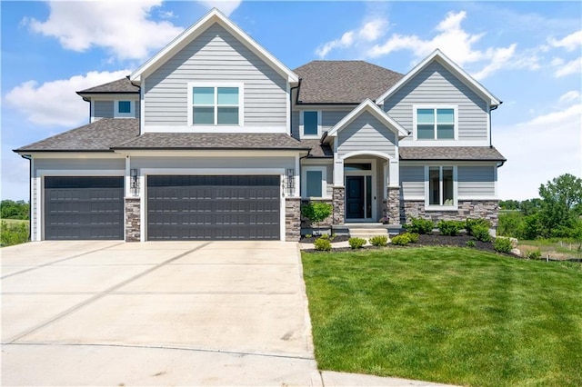 14616 Aspen Cir, Basehor, KS 66007 - craftsman house featuring a front lawn, roof with shingles, an attached garage, and concrete driveway
