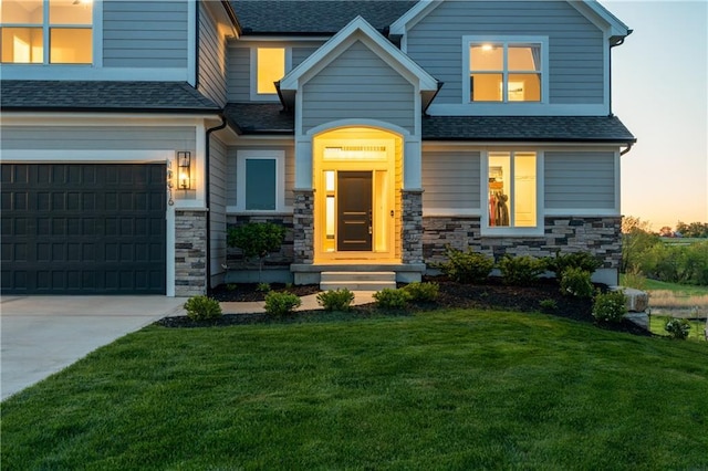 14616 Aspen Cir, Basehor, KS 66007 - craftsman inspired home featuring a garage, stone siding, a front yard, and roof with shingles