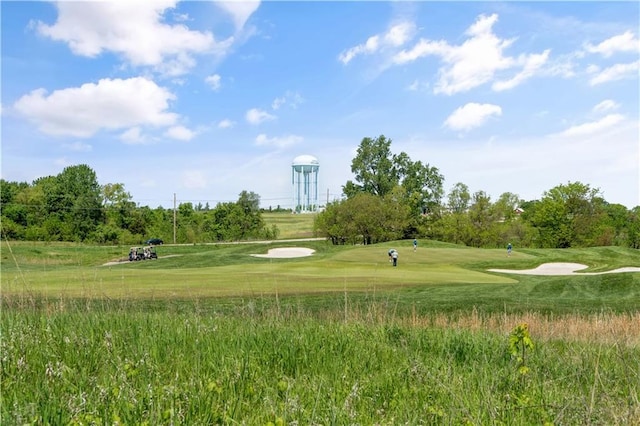 14616 Aspen Cir, Basehor, KS 66007 - surrounding community with golf course view and view of wooded area