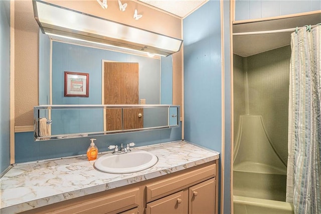 bathroom featuring vanity and walk in shower