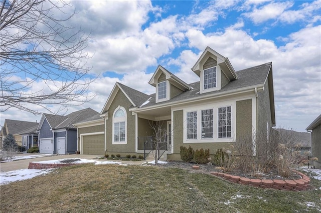 cape cod home with concrete driveway, a front yard, an attached garage, and stucco siding