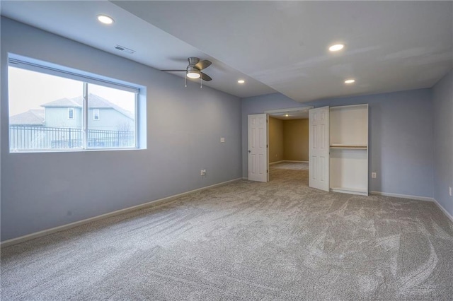 unfurnished bedroom with baseboards, carpet, visible vents, and recessed lighting