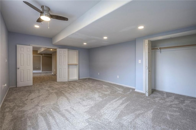 unfurnished bedroom with carpet, baseboards, and recessed lighting